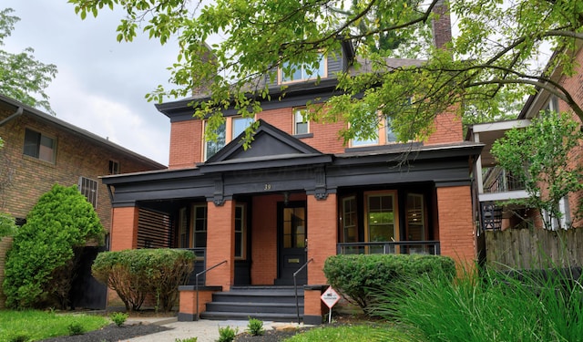 39 Auburn Ave, Columbus, OH 43205 - traditional style home with a porch, brick siding, and a chimney