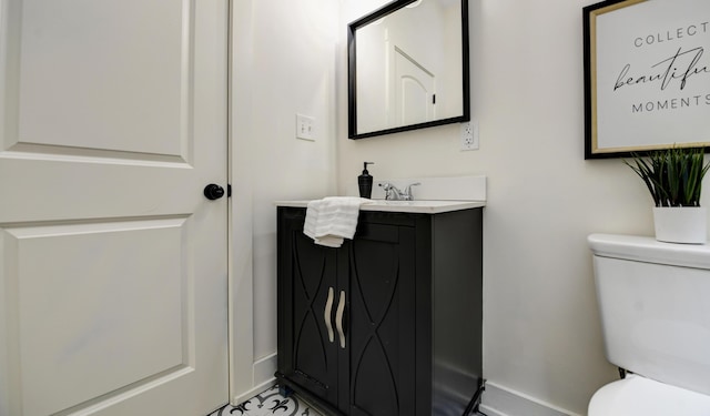 39 Auburn Ave, Columbus, OH 43205 - half bathroom featuring toilet, vanity, and baseboards