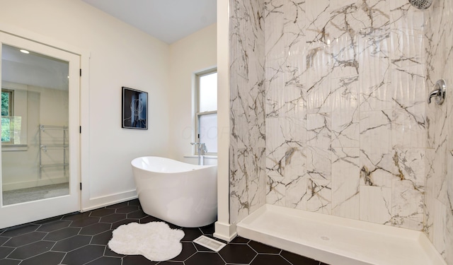 39 Auburn Ave, Columbus, OH 43205 - full bath featuring plenty of natural light, a shower, tile patterned flooring, and a freestanding bath