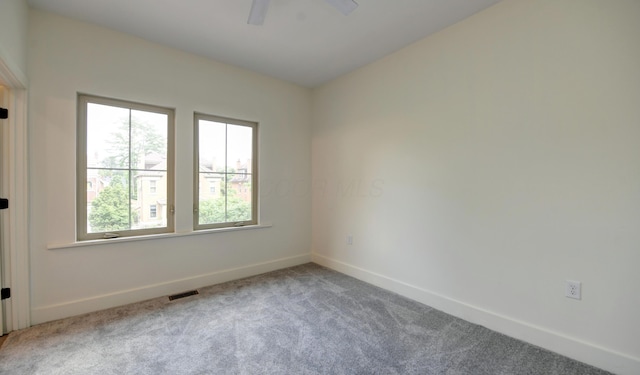 39 Auburn Ave, Columbus, OH 43205 - spare room featuring healthy amount of natural light, carpet, baseboards, and ceiling fan