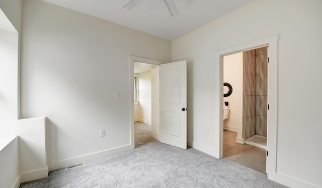 39 Auburn Ave, Columbus, OH 43205 - unfurnished bedroom featuring carpet floors, baseboards, ceiling fan, and ensuite bath