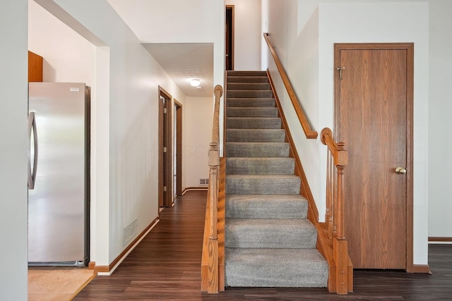 2147 Juneau Way, Grove City, OH 43123 - staircase featuring wood finished floors and baseboards