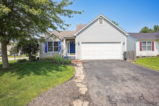 2147 Juneau Way, Grove City, OH 43123 - ranch-style house with asphalt driveway, a garage, and a front yard