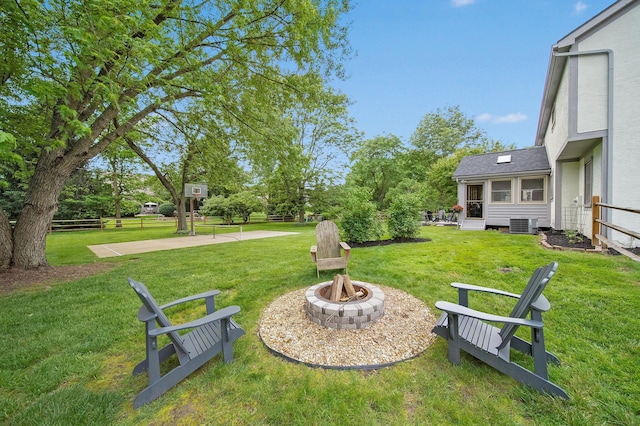 3040 Atoll Dr, Lewis Center, OH 43035 - view of grassy yard with a fire pit