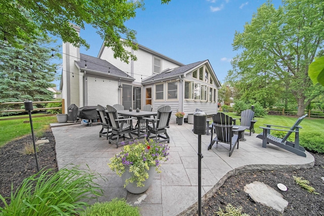 3040 Atoll Dr, Lewis Center, OH 43035 - view of patio / terrace featuring a sunroom and outdoor dining area