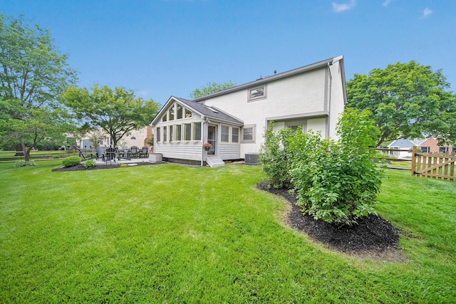 3040 Atoll Dr, Lewis Center, OH 43035 - rear view of property with a patio and a sunroom