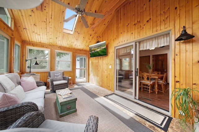 3040 Atoll Dr, Lewis Center, OH 43035 - sunroom / solarium with wood walls, a skylight, wood finished floors, and high vaulted ceiling