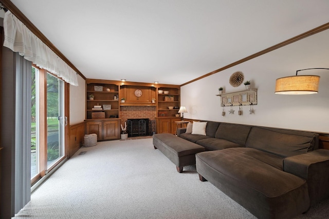 3040 Atoll Dr, Lewis Center, OH 43035 - carpeted living area with crown molding, a fireplace, and built in shelves