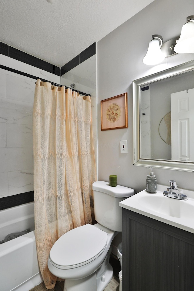 3216 Howey Rd, Columbus, OH 43224 - full bathroom featuring toilet, vanity, shower / bath combo, and a textured ceiling