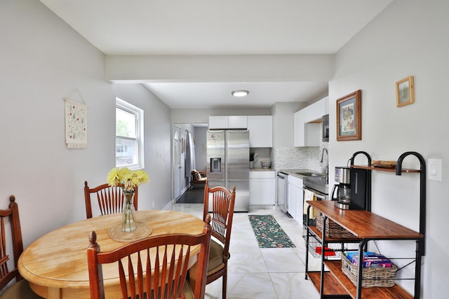 3216 Howey Rd, Columbus, OH 43224 - dining area with light tile patterned flooring