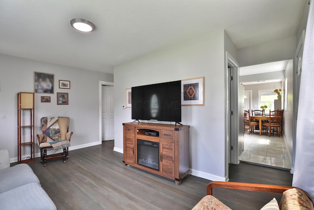3216 Howey Rd, Columbus, OH 43224 - living room featuring wood finished floors and baseboards