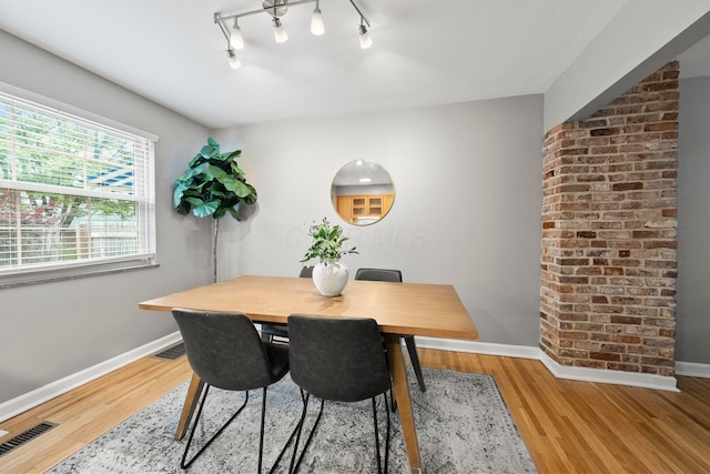 1831 NW Blvd Unit B, Columbus, OH 43212 - dining area featuring wood finished floors and rail lighting