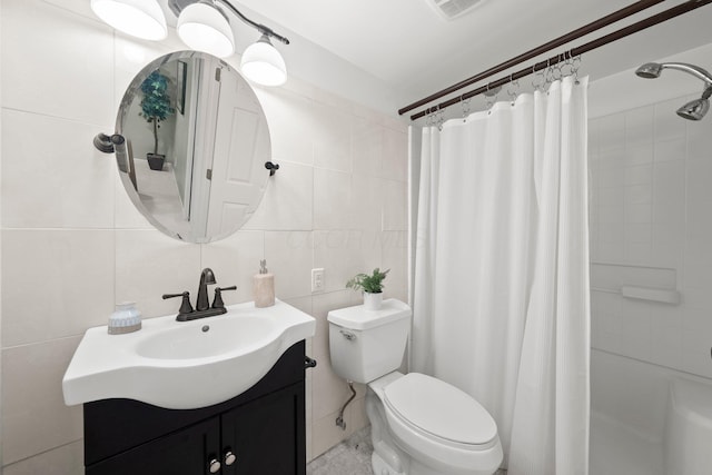 1831 NW Blvd Unit B, Columbus, OH 43212 - full bathroom with tile walls, vanity, and shower / bath combo