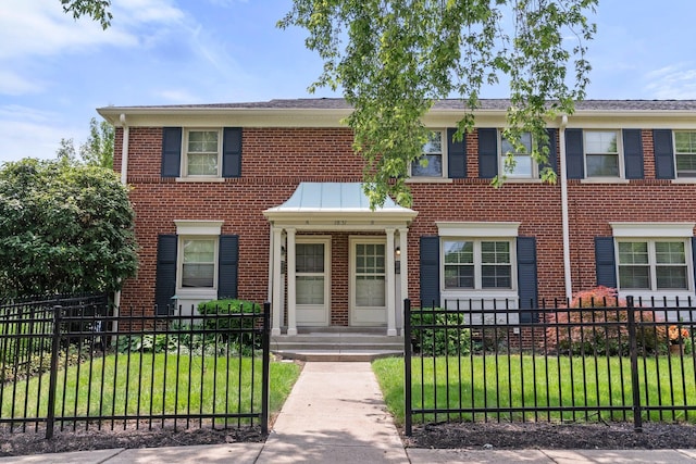 1831 NW Blvd Unit B, Columbus, OH 43212 - view of front of home with brick siding and a fenced front yard