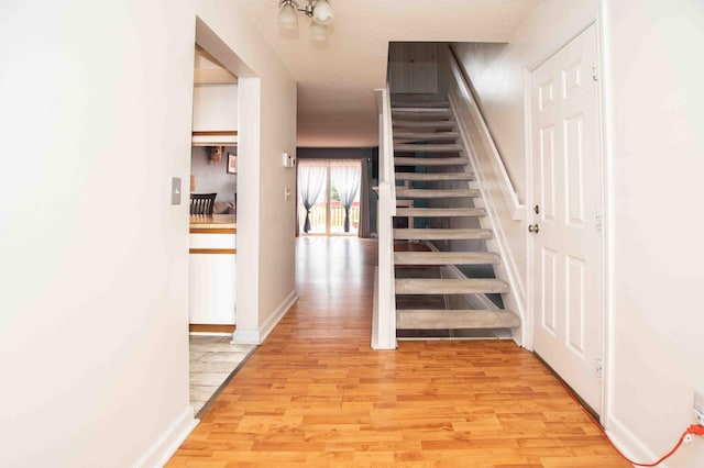 2043 Coleman Dr Unit 6F, Columbus, OH 43235 - stairway with wood finished floors and baseboards