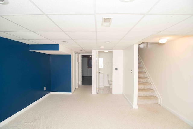 2043 Coleman Dr Unit 6F, Columbus, OH 43235 - finished below grade area featuring carpet, stairway, a paneled ceiling, and baseboards
