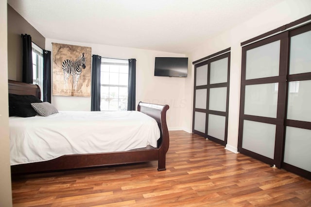2043 Coleman Dr Unit 6F, Columbus, OH 43235 - bedroom with wood finished floors and baseboards