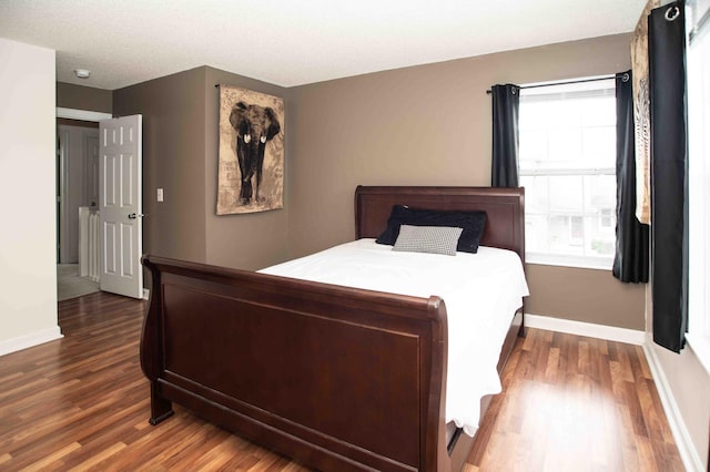 2043 Coleman Dr Unit 6F, Columbus, OH 43235 - bedroom featuring dark wood finished floors and baseboards