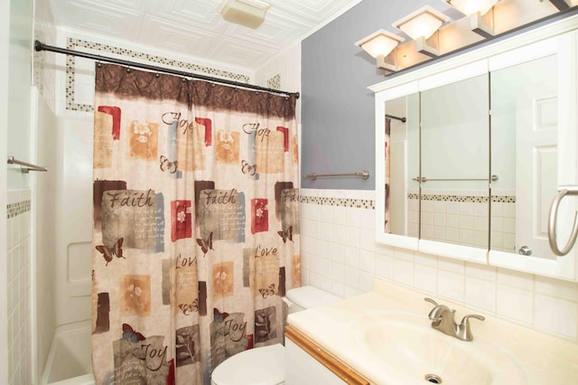 2043 Coleman Dr Unit 6F, Columbus, OH 43235 - bathroom with tile walls, vanity, toilet, tasteful backsplash, and an ornate ceiling