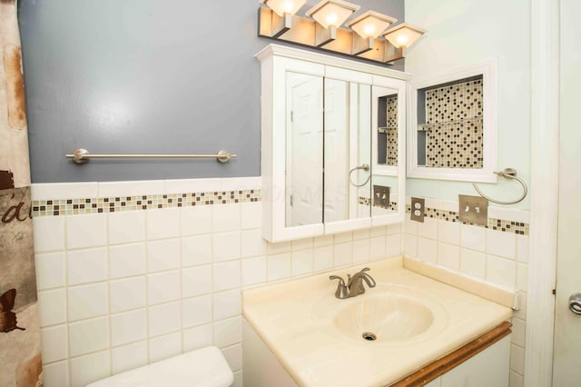 2043 Coleman Dr Unit 6F, Columbus, OH 43235 - bathroom with tile walls, vanity, and toilet