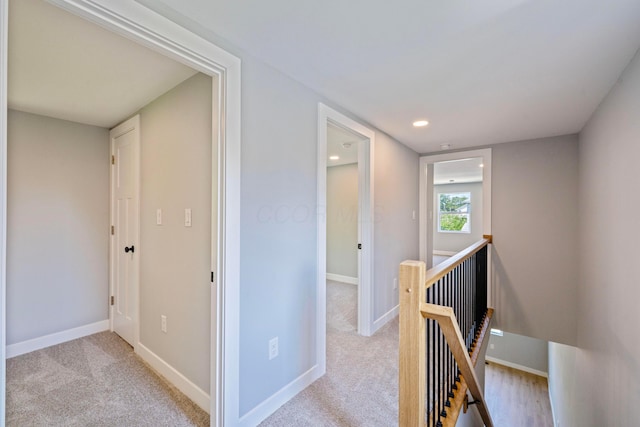 1275 Wager St, Columbus, OH 43206 - hallway with an upstairs landing, carpet flooring, and recessed lighting
