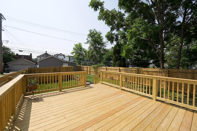 1275 Wager St, Columbus, OH 43206 - wooden terrace with a fenced backyard and a garage