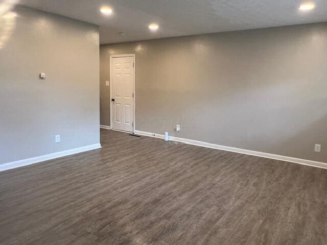1416 Benson Dr, Columbus, OH 43227 - spare room featuring dark wood-style floors and recessed lighting