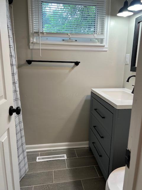 1416 Benson Dr, Columbus, OH 43227 - bathroom with vanity and tile patterned floors