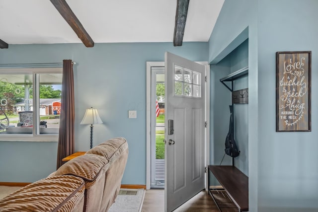 5452 Roche Ct W, Columbus, OH 43229 - entryway featuring beam ceiling, healthy amount of natural light, and wood finished floors