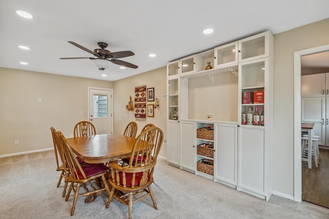 5452 Roche Ct W, Columbus, OH 43229 - dining room with light colored carpet, a ceiling fan, and recessed lighting