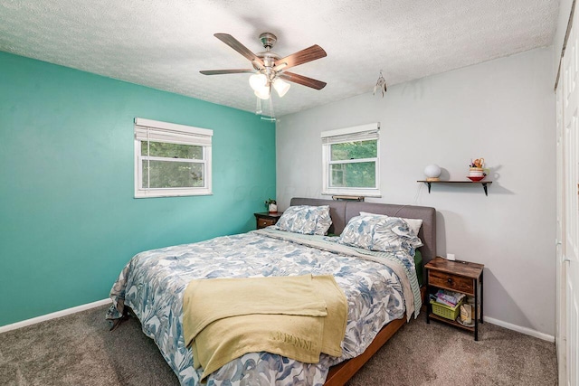 6563 Karl Rd, Columbus, OH 43229 - carpeted bedroom featuring ceiling fan and a textured ceiling
