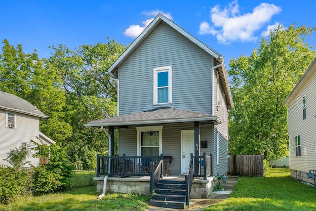 972 E 12th Ave, Columbus, OH 43211 - view of front of home featuring covered porch and roof with shingles