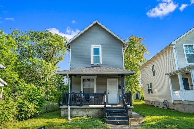 972 E 12th Ave, Columbus, OH 43211 - view of front facade featuring covered porch