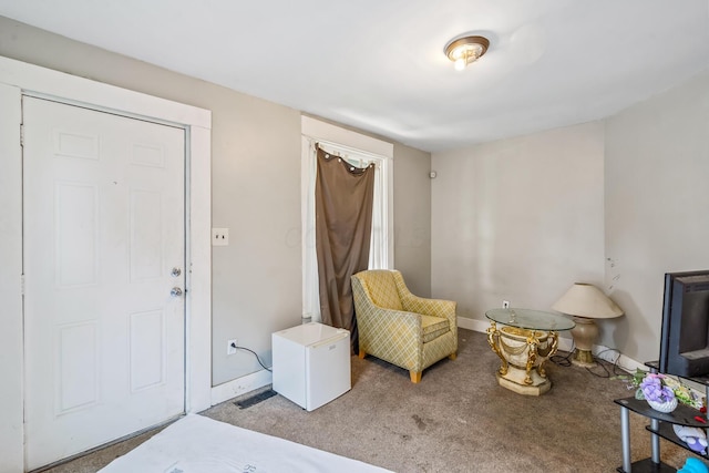 972 E 12th Ave, Columbus, OH 43211 - living area with baseboards and carpet floors