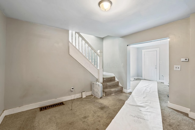 972 E 12th Ave, Columbus, OH 43211 - carpeted entryway with stairway