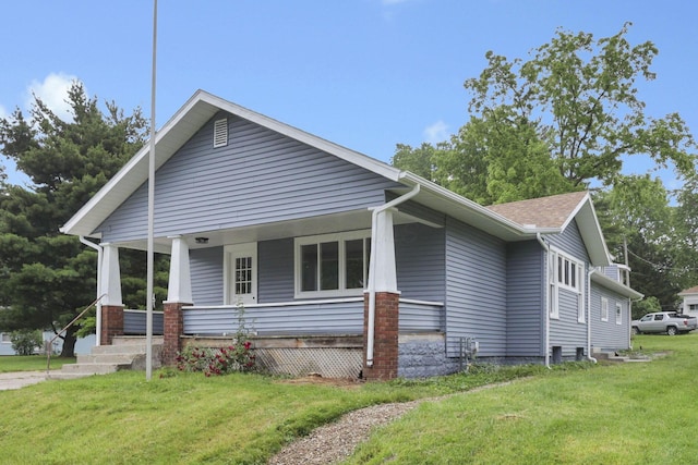 704 N Detroit St, Bellefontaine, OH 43311 - view of front of home featuring a front yard and covered porch