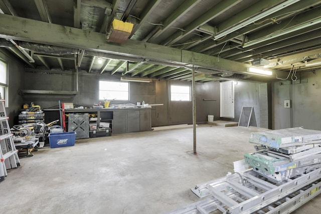 704 N Detroit St, Bellefontaine, OH 43311 - basement featuring a workshop area