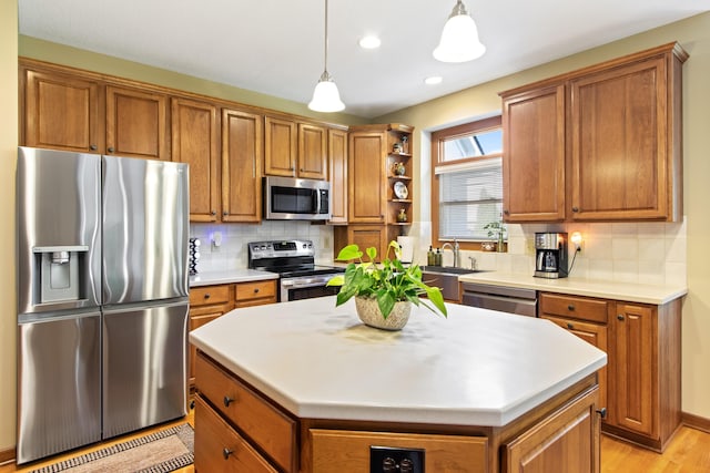 5839 Ketch St, Lewis Center, OH 43035 - kitchen with appliances with stainless steel finishes, brown cabinets, a center island, open shelves, and recessed lighting