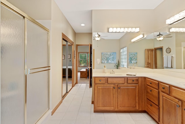 5839 Ketch St, Lewis Center, OH 43035 - full bathroom featuring a ceiling fan, tile patterned floors, a shower stall, vanity, and recessed lighting