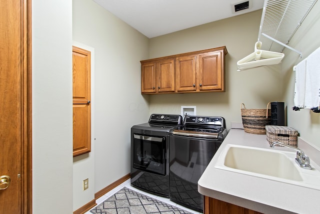 5839 Ketch St, Lewis Center, OH 43035 - laundry area featuring cabinet space and washing machine and clothes dryer