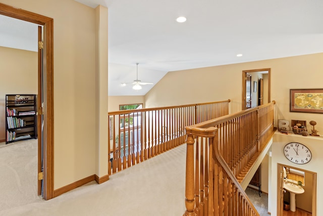 5839 Ketch St, Lewis Center, OH 43035 - hallway featuring carpet floors, an upstairs landing, vaulted ceiling, and recessed lighting