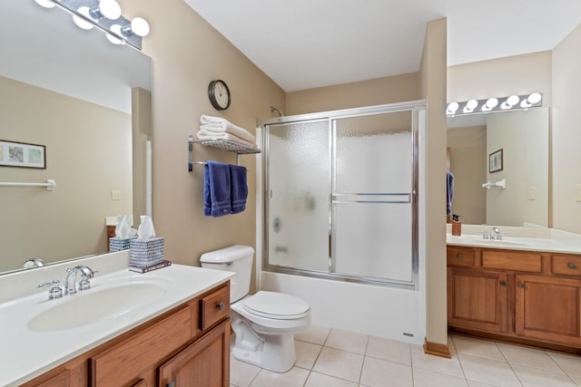 5839 Ketch St, Lewis Center, OH 43035 - full bath featuring tile patterned flooring, vanity, and combined bath / shower with glass door