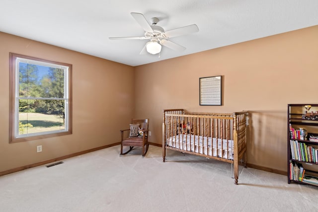 5839 Ketch St, Lewis Center, OH 43035 - carpeted bedroom with ceiling fan and a nursery area