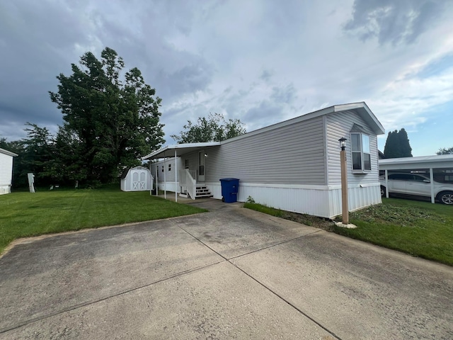 13 Birch Row Dr, Delaware, OH 43015 - view of front of home featuring a storage unit, a front yard, and concrete driveway