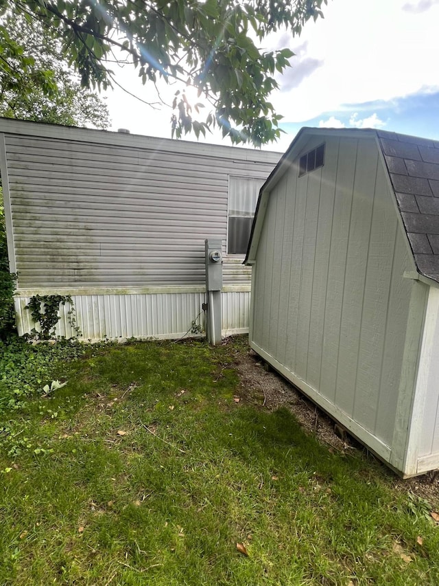 13 Birch Row Dr, Delaware, OH 43015 - view of green lawn with a storage unit