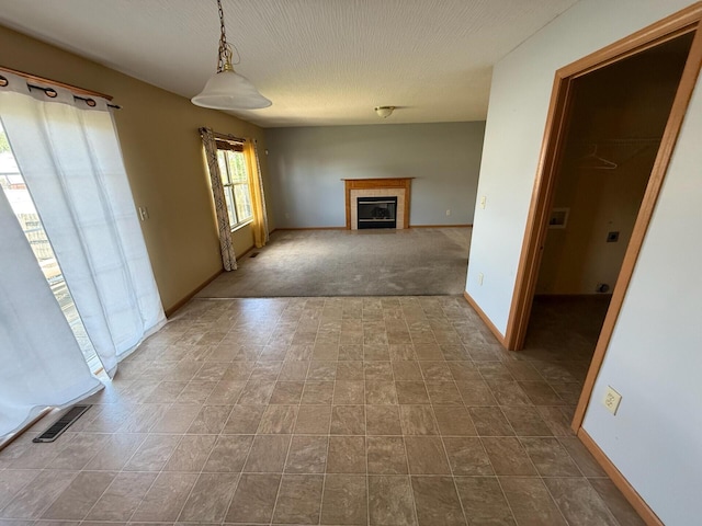 3126 Zach Ct, Columbus, OH 43219 - unfurnished living room featuring baseboards and a fireplace