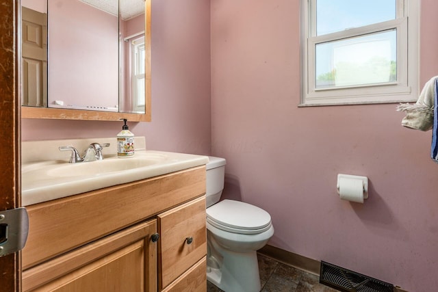 2655 Blendon Woods Blvd Unit 2644, Columbus, OH 43231 - bathroom featuring healthy amount of natural light, toilet, and vanity