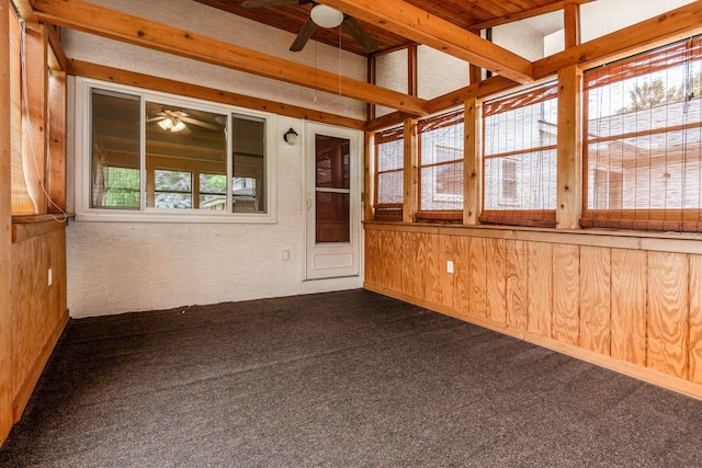 2655 Blendon Woods Blvd Unit 2644, Columbus, OH 43231 - unfurnished sunroom featuring carpet floors, wood walls, and beamed ceiling