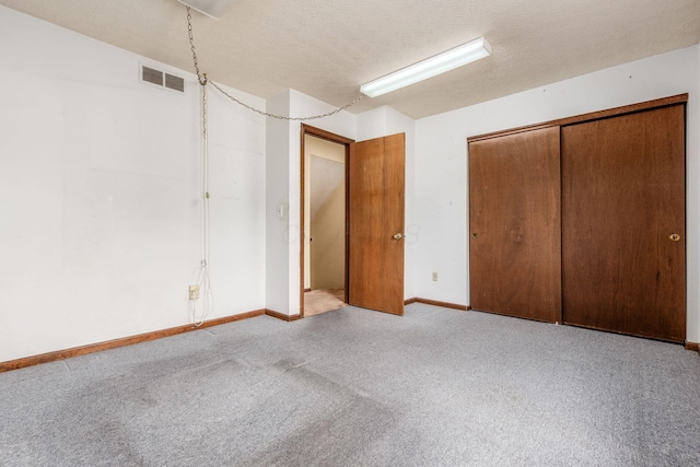 2655 Blendon Woods Blvd Unit 2644, Columbus, OH 43231 - unfurnished bedroom with carpet floors, baseboards, a textured ceiling, and a closet