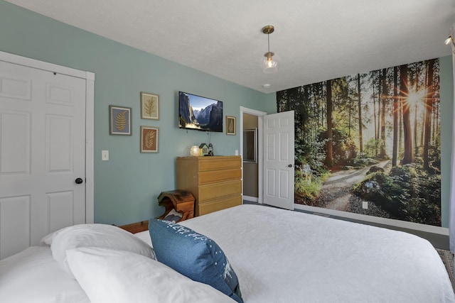 107 N Factory St, Baltimore, OH 43105 - bedroom with baseboards and a textured ceiling